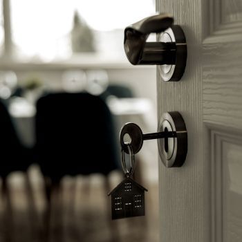 a doorknob with a house key