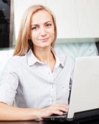 women doing banking on laptop
