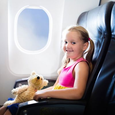 Child in Airplane on Vacation