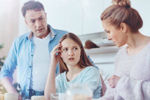 Parents telling older girl about separation