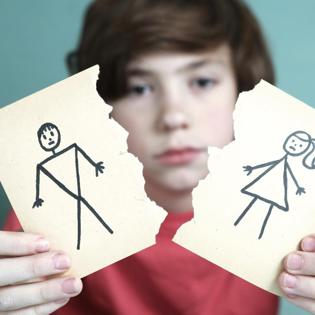Boy Holding Paper Parents Divorcing